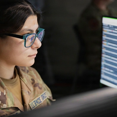 US Space Force guardian working on a desktop computer.