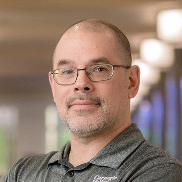 Headshot of Mark Novakouski.