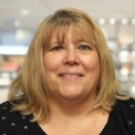 Headshot of Robin M Ruefle.