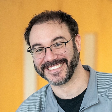 Headshot of Michael Szegedy.