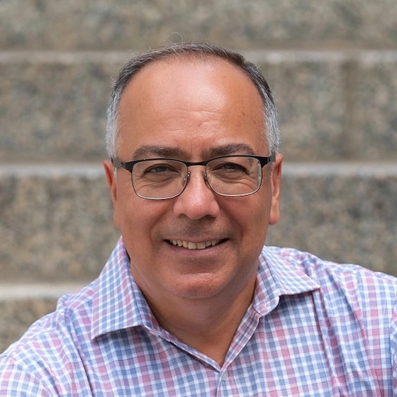 Headshot of Hasan Yasar.