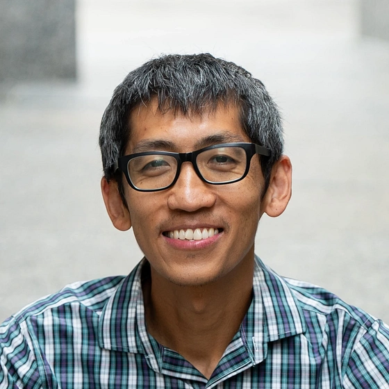 Headshot of Shen Zhang.