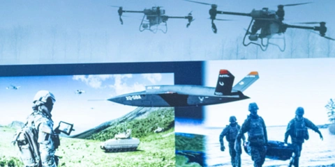 SEI employee presenting a slide outlining the Artificial Intelligence Division.