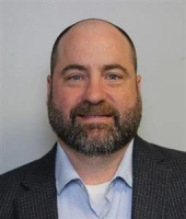 Headshot of Christopher Miller.