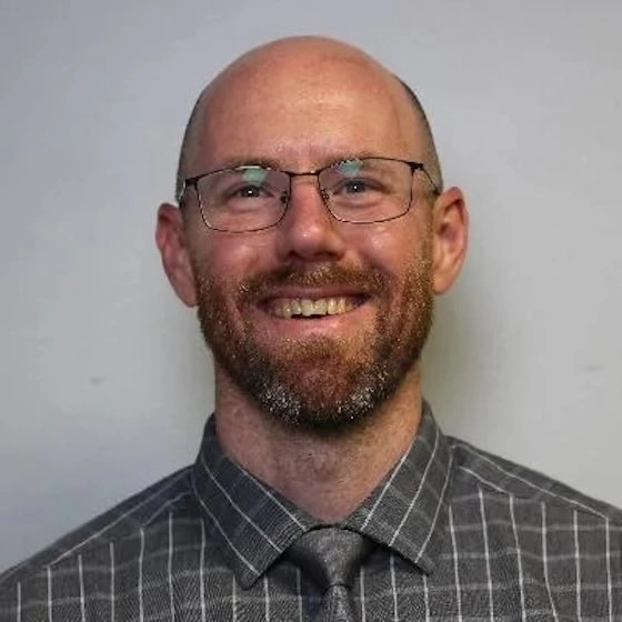 Headshot of David Schulker.