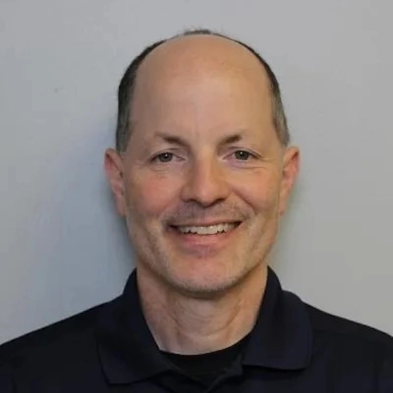 Headshot of John DiRicco.