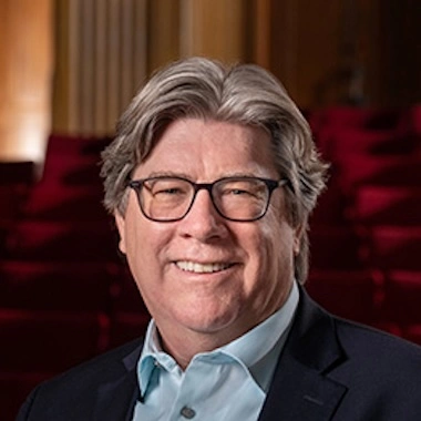 Headshot of Michael McQuade.