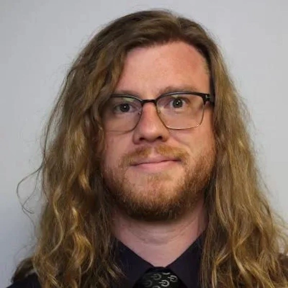 Headshot of Nicholas Testa.