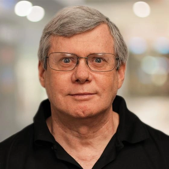 Headshot of Joseph Mayes.