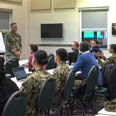 Photo of war fighters receiving instruction