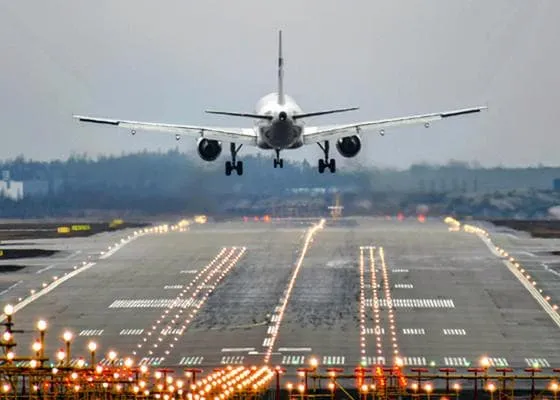 A plane departing from an airstrip.