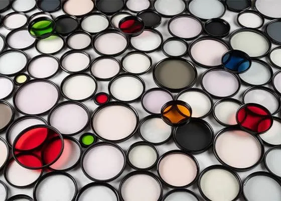 Colorful plastic circles sitting adjacent to or on top of one another.