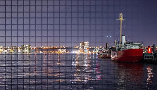 A boat parked at a dock.